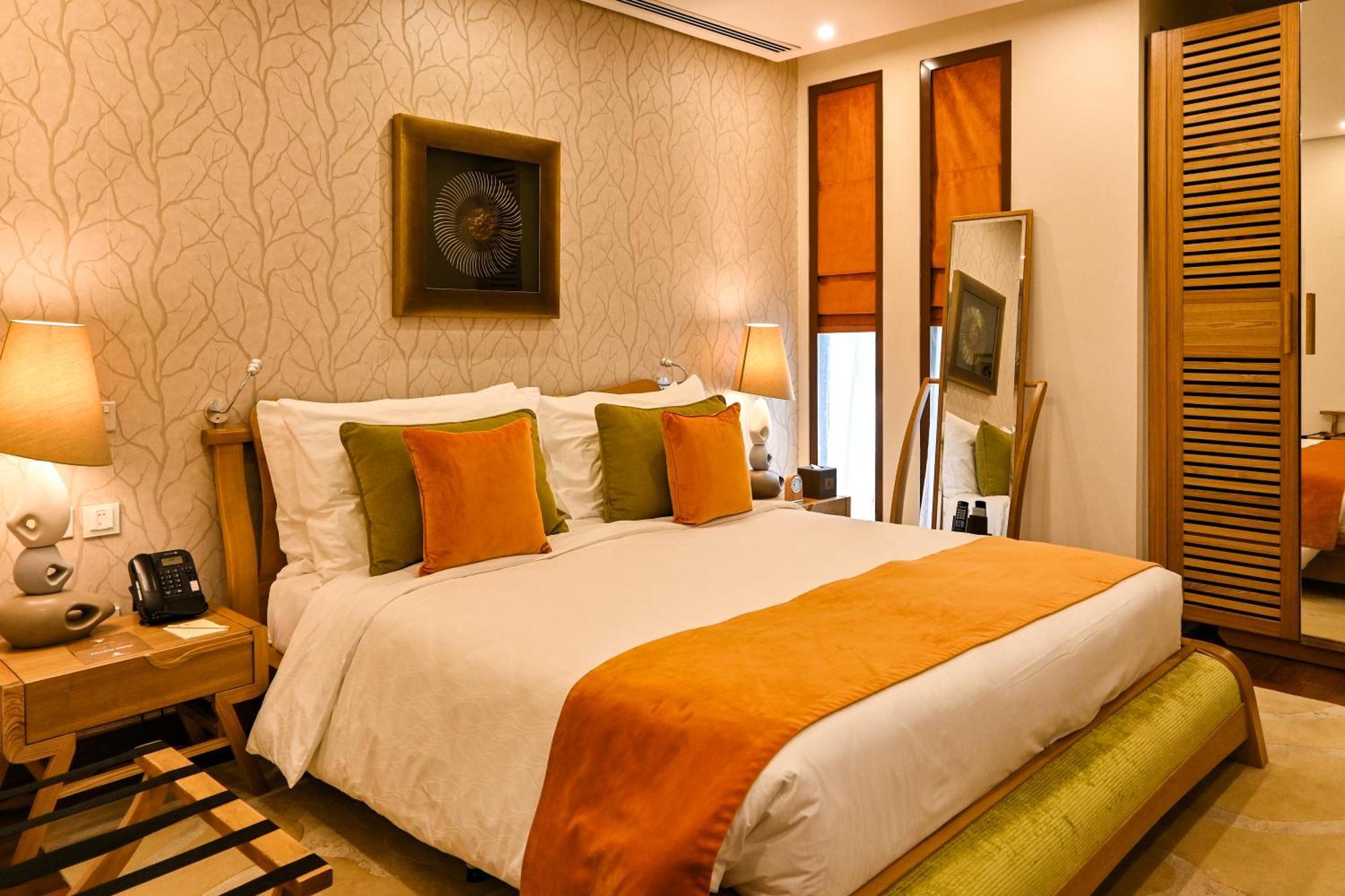 Palavra Resort Manama Exteriör bild A bedroom at the Taj Bengal