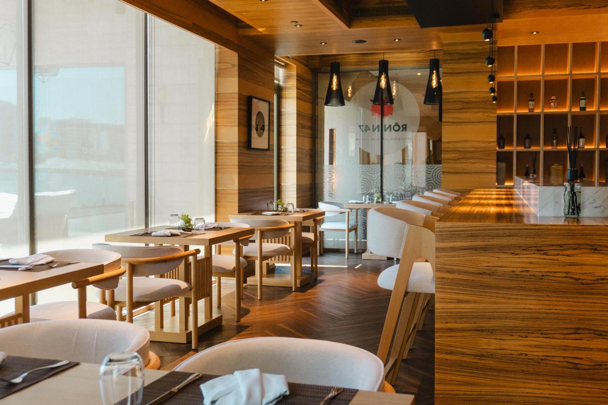 Palavra Resort Manama Exteriör bild Interior of the restaurant