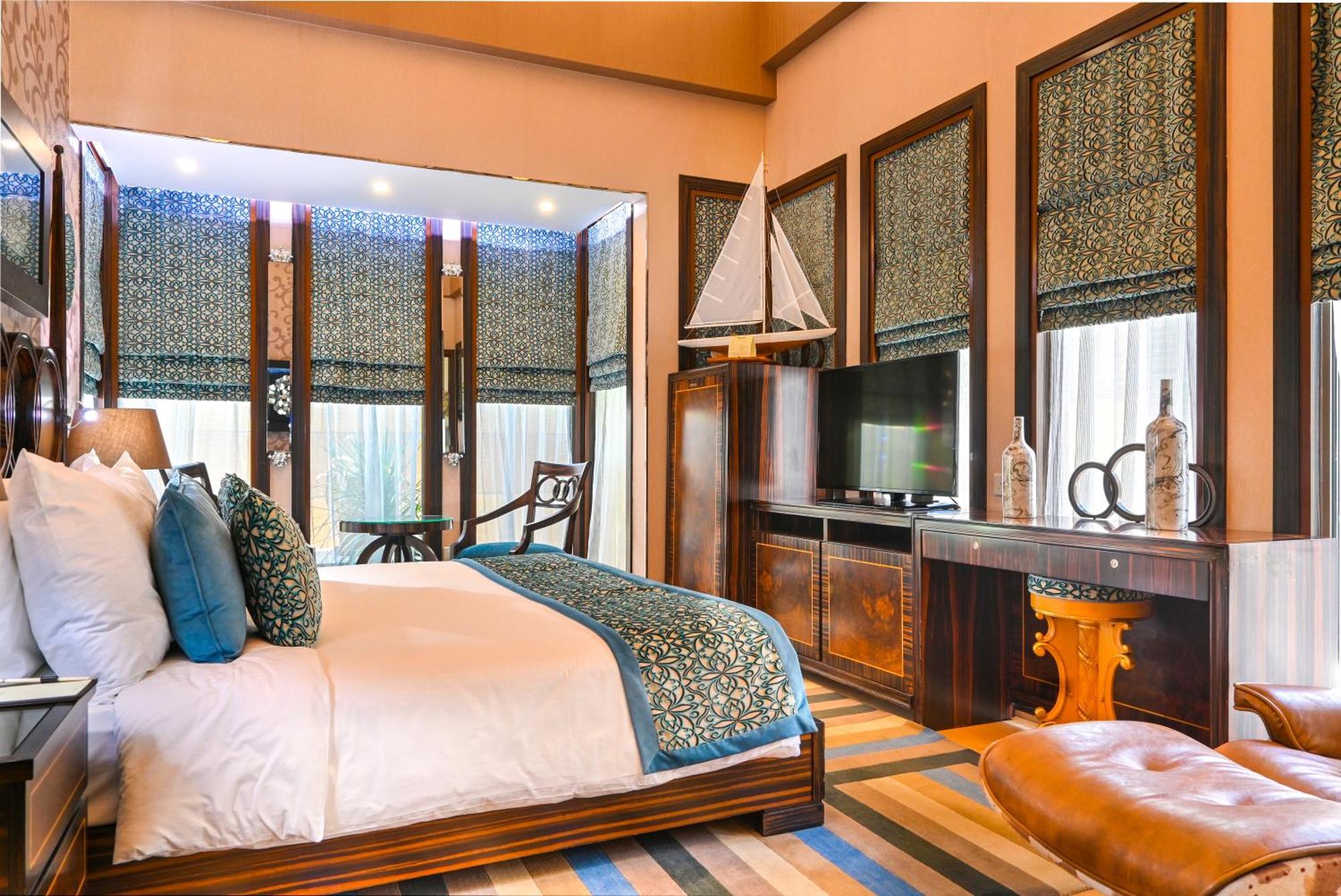 Palavra Resort Manama Exteriör bild A bedroom at the resort