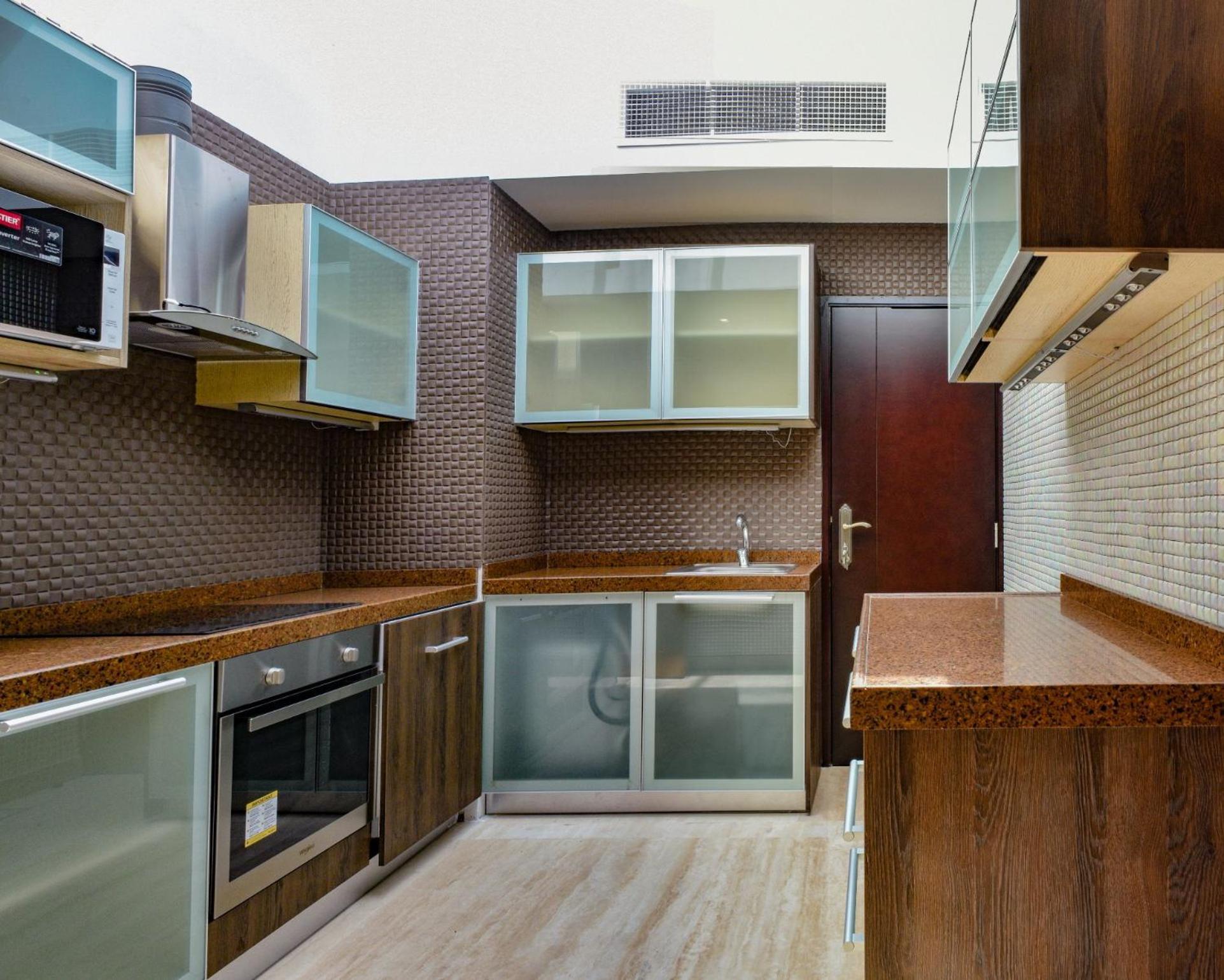 Palavra Resort Manama Exteriör bild A modern kitchen