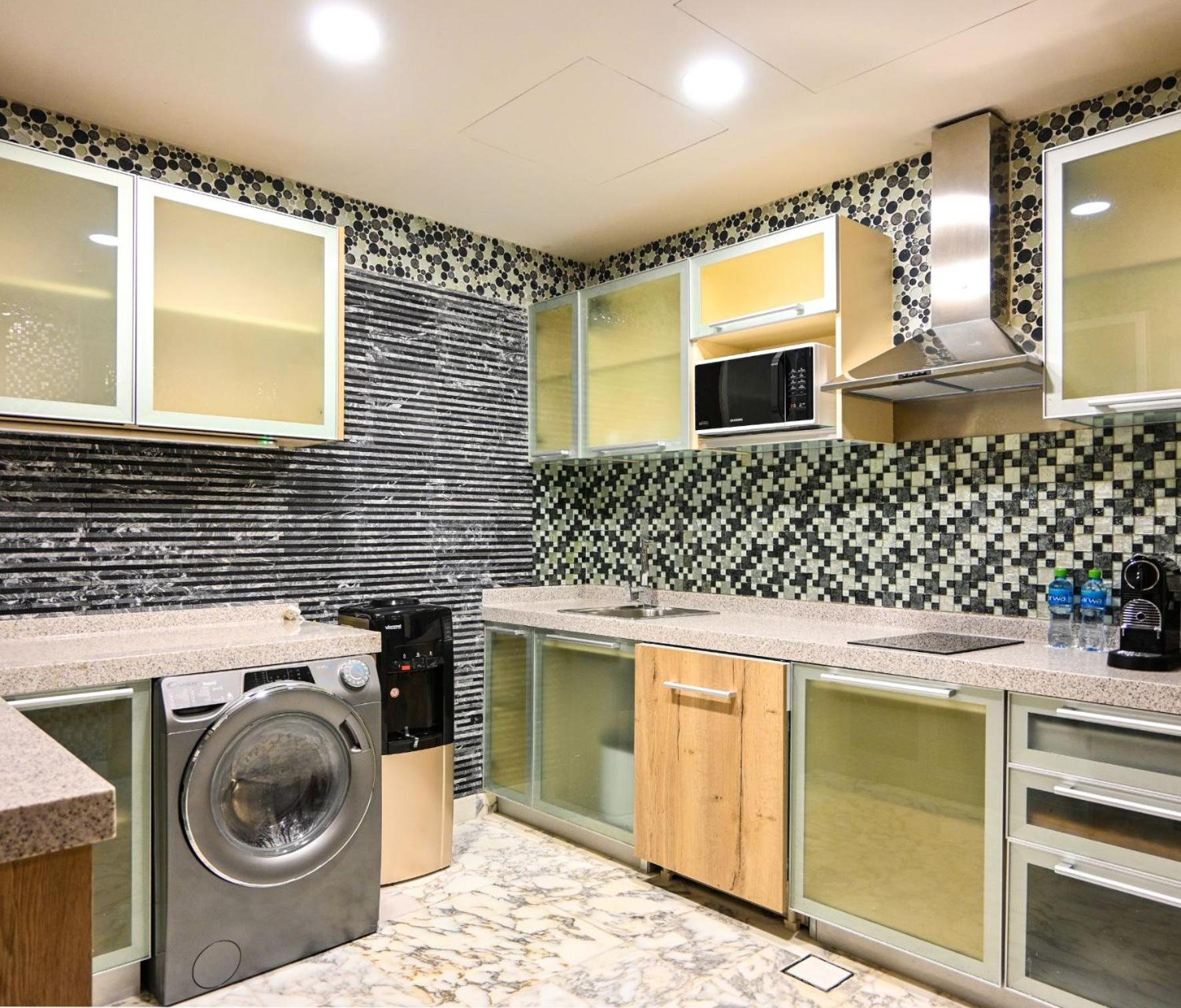Palavra Resort Manama Exteriör bild A modern kitchen